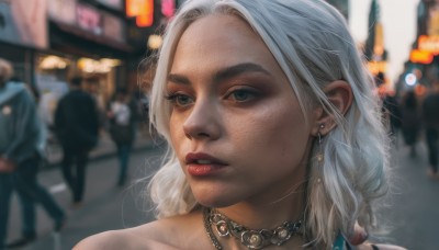 1girl,long hair,blue eyes,bare shoulders,jewelry,white hair,earrings,outdoors,parted lips,solo focus,choker,necklace,blurry,lips,looking to the side,grey eyes,depth of field,blurry background,looking away,portrait,freckles,realistic,nose,red lips,mole on cheek,solo,short hair,grey hair,teeth,makeup,lipstick,crowd