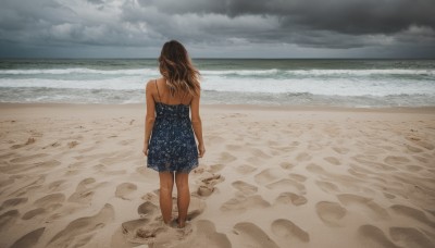 1girl,solo,long hair,brown hair,dress,bare shoulders,standing,outdoors,sky,barefoot,day,cloud,water,from behind,bare arms,blue dress,ocean,beach,cloudy sky,scenery,walking,sand,arms at sides,horizon,facing away,waves,shore,footprints,sleeveless,black dress,bare legs,sleeveless dress,dirty feet