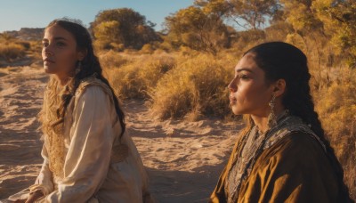 long hair,multiple girls,black hair,long sleeves,dress,2girls,jewelry,closed mouth,upper body,braid,earrings,outdoors,parted lips,sky,day,water,black eyes,from side,tree,lips,profile,siblings,looking up,sisters,nature,scenery,robe,realistic,nose,looking afar,river,multiple braids,looking at viewer,brown eyes,dark skin,dark-skinned female,ocean,sunlight,curly hair,sand,autumn,lake,fine art parody