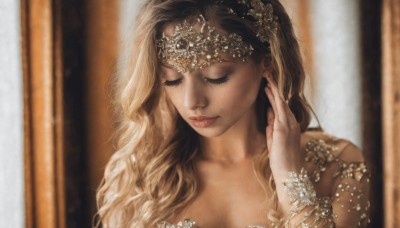 1girl,solo,long hair,breasts,blonde hair,brown hair,hair ornament,cleavage,jewelry,closed mouth,collarbone,closed eyes,upper body,blurry,lips,eyelashes,depth of field,blurry background,wavy hair,tiara,portrait,curly hair,circlet,realistic,dress,bracelet