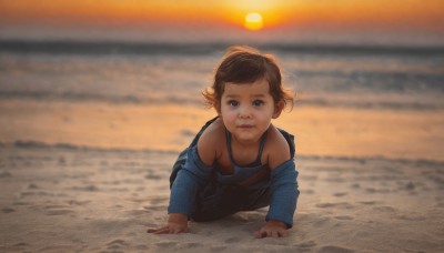 1girl,solo,breasts,looking at viewer,short hair,brown hair,long sleeves,brown eyes,closed mouth,outdoors,off shoulder,blurry,lips,blurry background,ocean,beach,tank top,all fours,sunset,realistic,sand,sun,overalls,sky,pants,water,child,dirty