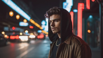 solo,looking at viewer,short hair,shirt,black hair,1boy,jewelry,jacket,upper body,male focus,outdoors,hood,necklace,blurry,black eyes,hoodie,night,depth of field,blurry background,facial hair,beard,hood up,brown jacket,city,realistic,stubble,brown eyes,closed mouth,black jacket,looking to the side,hooded jacket