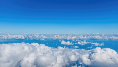 outdoors,sky,day,cloud,blue sky,no humans,bird,ocean,cloudy sky,scenery,flying,blue theme,city,horizon,cityscape,landscape,above clouds,monochrome