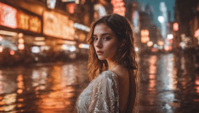 1girl,solo,long hair,looking at viewer,brown hair,black hair,dress,brown eyes,closed mouth,upper body,outdoors,looking back,white dress,blurry,from side,lips,night,depth of field,blurry background,reflection,backless outfit,realistic,nose,backless dress,bokeh,breasts,dark skin,water,dark-skinned female,city lights