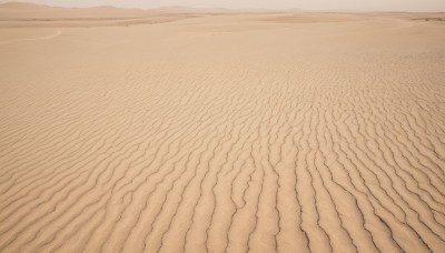 monochrome,outdoors,sky,water,no humans,ocean,beach,scenery,sand,horizon,shore,desert