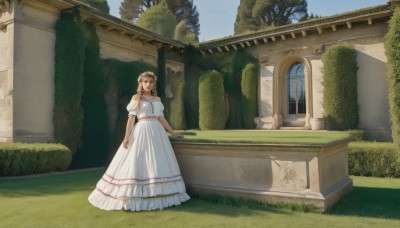 1girl,solo,long hair,breasts,looking at viewer,smile,bangs,blonde hair,brown hair,hair ornament,dress,green eyes,standing,flower,short sleeves,outdoors,day,puffy sleeves,hair flower,white dress,tree,puffy short sleeves,window,grass,plant,building,scenery,long dress,head wreath,ruins,wide shot,arch,brown eyes,sky,blue sky,bush,pillar,moss,overgrown