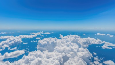 monochrome,outdoors,sky,day,cloud,water,blue sky,no humans,ocean,cloudy sky,scenery,blue theme,horizon,above clouds