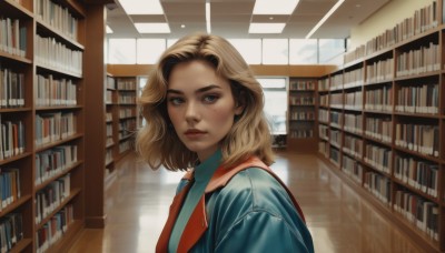 1girl,solo,looking at viewer,short hair,blue eyes,blonde hair,brown hair,shirt,closed mouth,upper body,parted lips,indoors,medium hair,mole,from side,lips,book,mole under eye,makeup,sunlight,blue shirt,freckles,realistic,nose,bookshelf,red lips,library,ceiling,jacket,thick eyebrows,blue jacket,scenery,forehead