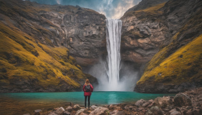 1girl, solo, long hair, blonde hair, standing, jacket, outdoors, sky, day, pants, cloud, water, bag, from behind, black pants, backpack, scenery, red jacket, rock, hands in pockets, facing away, wide shot, waterfall