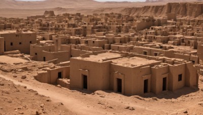 monochrome,outdoors,sky,cloud,no humans,building,scenery,city,sand,road,cityscape,ruins,house,sepia,brown theme,desert,day,rock,mountain