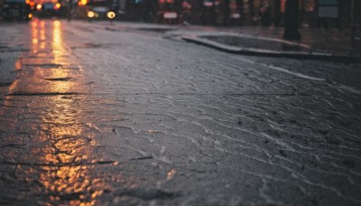 outdoors,water,blurry,tree,no humans,night,depth of field,blurry background,building,scenery,reflection,city,sign,road,lamppost,street,city lights,ground vehicle,motor vehicle,rain,car,light,bokeh,puddle,photo background,lights,pavement,crosswalk,sidewalk