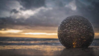 outdoors, food, sky, cloud, blurry, dutch angle, no humans, ocean, beach, cloudy sky, scenery, sunset, sand, horizon