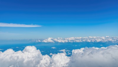 monochrome,outdoors,sky,day,cloud,water,blue sky,no humans,ocean,cloudy sky,scenery,blue theme,horizon,landscape,above clouds