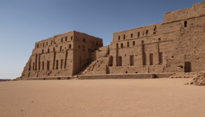 outdoors,sky,day,blue sky,no humans,building,scenery,sand,ruins,desert,rock,dust