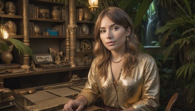 1girl,solo,long hair,looking at viewer,smile,bangs,brown hair,shirt,long sleeves,brown eyes,jewelry,sitting,upper body,earrings,parted lips,indoors,water,necklace,lips,book,chair,table,plant,realistic,nose,bookshelf,potted plant,lamp,shelf,jar,parted bangs,leaf,wavy hair,bottle,scenery,paper,brown shirt