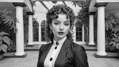 1girl,solo,long hair,breasts,looking at viewer,smile,shirt,jewelry,closed mouth,jacket,monochrome,upper body,greyscale,earrings,indoors,lips,window,makeup,buttons,formal,suit,plant,lipstick,curly hair,hoop earrings,realistic,potted plant,pillar,arch,column,outdoors,parted lips,collared shirt,medium hair,leaf,bush,garden