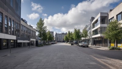 outdoors,sky,day,cloud,tree,blue sky,no humans,window,shadow,watermark,cloudy sky,ground vehicle,building,scenery,motor vehicle,city,sign,car,road,bush,cityscape,lamppost,street,crosswalk,sidewalk,real world location,bus