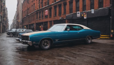 outdoors,no humans,ground vehicle,building,scenery,motor vehicle,city,realistic,car,road,vehicle focus,lamppost,street,wheel,sports car,truck,tire