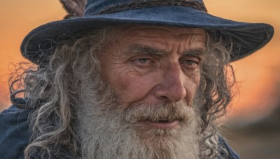 solo,looking at viewer,1boy,hat,animal ears,closed mouth,green eyes,grey hair,male focus,outdoors,signature,blurry,blurry background,facial hair,portrait,beard,blue headwear,curly hair,realistic,mustache,hat feather,old,old man,white hair,lips