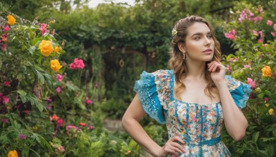 1girl,solo,long hair,brown hair,hair ornament,dress,brown eyes,jewelry,upper body,flower,short sleeves,earrings,outdoors,frills,day,hand up,hair flower,blurry,tree,lips,hand on hip,looking to the side,depth of field,blurry background,blue dress,looking away,floral print,plant,nature,pink flower,realistic,yellow flower,nose,hand on own chin,looking afar,garden,parted lips