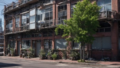 outdoors,sky,day,tree,no humans,window,sunlight,plant,ground vehicle,building,scenery,stairs,city,railing,potted plant,road,cityscape,house,power lines,street,utility pole,air conditioner,motor vehicle,fence,car,bush,lamppost