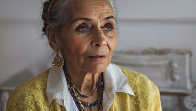 1girl,solo,blue eyes,shirt,black hair,jewelry,closed mouth,white shirt,upper body,grey hair,earrings,collared shirt,indoors,dark skin,necklace,hair bun,blurry,lips,looking to the side,blurry background,looking away,single hair bun,portrait,realistic,nose,old,old man,pearl necklace,old woman,wrinkled skin,real life insert