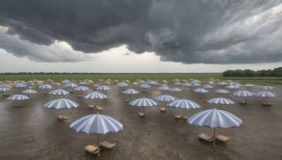 outdoors,sky,day,cloud,water,tree,no humans,ocean,umbrella,chair,beach,table,cloudy sky,nature,scenery,sand,horizon,landscape,watercraft,beach umbrella,boat,shore