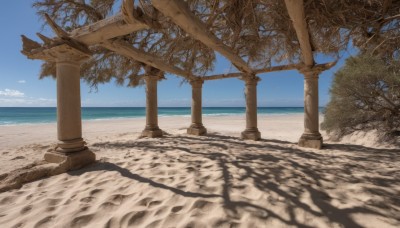 outdoors,sky,day,cloud,water,tree,blue sky,no humans,shadow,ocean,beach,sunlight,scenery,sand,horizon,shade,pillar,shore,column,palm tree,branch