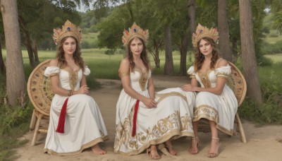 long hair,breasts,looking at viewer,smile,multiple girls,brown hair,dress,cleavage,bare shoulders,brown eyes,jewelry,medium breasts,sitting,outdoors,barefoot,puffy sleeves,3girls,white dress,high heels,bracelet,tree,toes,chair,sandals,grass,tiara,crown,nature,armlet,forest,realistic,anklet,hair ornament,braid,twin braids,feet,barefoot sandals