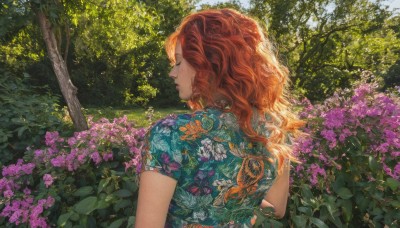 1girl,solo,long hair,shirt,closed eyes,upper body,flower,short sleeves,red hair,outdoors,day,from behind,orange hair,tree,lips,profile,leaf,wavy hair,floral print,plant,animal print,nature,forest,curly hair,realistic,green shirt,purple flower,print shirt,dress,closed mouth,eyelashes,sunlight,pink flower,bush