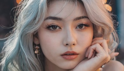 1girl,solo,long hair,looking at viewer,brown eyes,jewelry,white hair,earrings,parted lips,teeth,hand up,blurry,lips,eyelashes,depth of field,blurry background,portrait,close-up,hand on own face,freckles,head rest,realistic,bangs,nose