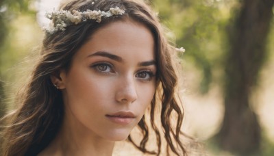 1girl,solo,long hair,looking at viewer,brown hair,hair ornament,brown eyes,jewelry,closed mouth,flower,earrings,outdoors,parted lips,blurry,tree,lips,eyelashes,depth of field,blurry background,sunlight,portrait,realistic,nose,head wreath,day,nature,close-up