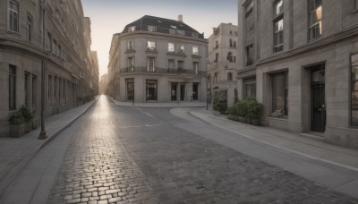 outdoors,sky,day,tree,no humans,window,plant,building,scenery,city,door,road,bush,cityscape,house,lamppost,street,town,pavement,cloud,blue sky,shadow,sunlight,sunset,path,vanishing point,sidewalk