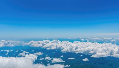 monochrome,outdoors,sky,day,cloud,blue sky,no humans,ocean,cloudy sky,scenery,blue theme,mountain,horizon,landscape,above clouds,water