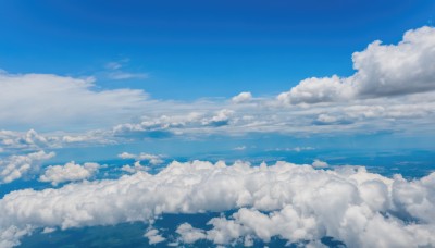 monochrome,outdoors,sky,day,cloud,blue sky,no humans,ocean,cloudy sky,scenery,blue theme,horizon,above clouds