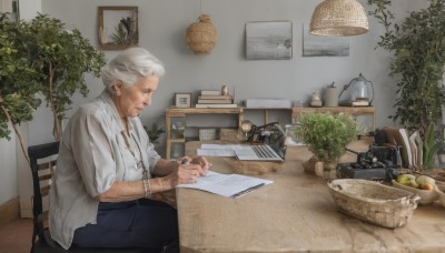 solo,shirt,1boy,holding,jewelry,sitting,closed mouth,white shirt,white hair,grey hair,male focus,food,pants,indoors,necklace,bracelet,from side,cup,book,fruit,facial hair,chair,table,ring,plant,beard,watch,paper,realistic,camera,blue pants,basket,pen,wristwatch,potted plant,lamp,photo (object),old,old man,newspaper,old woman,desk lamp,wrinkled skin,1girl,short hair,glasses,tattoo,profile,jar