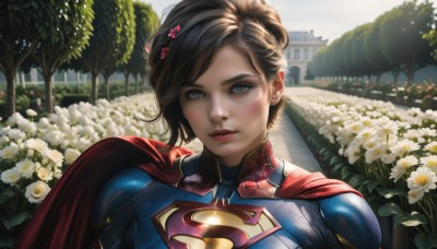 1girl,solo,looking at viewer,smile,short hair,blue eyes,brown hair,black hair,hair ornament,upper body,flower,outdoors,parted lips,day,hair flower,cape,tree,lips,bodysuit,makeup,white flower,building,realistic,red cape,dirty,superhero,blue bodysuit,blush,bangs,green eyes,blurry,blurry background,sunlight,portrait,backlighting