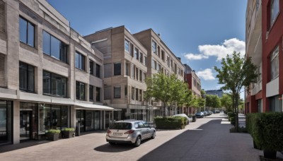 outdoors,sky,day,cloud,tree,blue sky,no humans,window,shadow,ground vehicle,building,scenery,motor vehicle,city,car,road,bush,cityscape,house,vehicle focus,lamppost,street,crosswalk,watermark