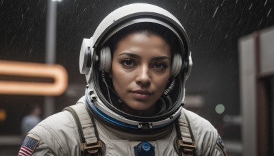 1girl,solo,looking at viewer,smile,black hair,1boy,brown eyes,closed mouth,upper body,solo focus,dark skin,blurry,black eyes,lips,depth of field,blurry background,helmet,reflection,rain,realistic,nose,american flag,spacesuit,astronaut,outdoors,headphones,portrait,forehead,space helmet