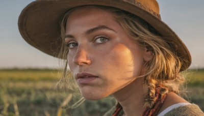 1girl,solo,long hair,looking at viewer,blonde hair,shirt,hat,braid,outdoors,parted lips,day,blurry,lips,grey eyes,depth of field,blurry background,portrait,freckles,realistic,nose,brown headwear,straw hat,cowboy hat,brown eyes,sky,eyelashes,sunlight,close-up,field