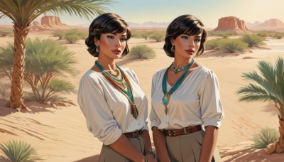 breasts,short hair,bangs,multiple girls,brown hair,shirt,black hair,long sleeves,2girls,brown eyes,jewelry,medium breasts,collarbone,white shirt,earrings,outdoors,parted lips,sky,day,belt,pants,dark skin,necklace,hair bun,looking at another,black eyes,bracelet,dark-skinned female,tree,lips,makeup,siblings,beach,sunlight,single hair bun,grass,lipstick,sisters,sleeves rolled up,twins,hoop earrings,rock,belt buckle,sand,palm tree,red lips,bangle,brown belt,sleeves past elbows,desert,looking at viewer,smile,closed mouth,standing,water,looking to the side,own hands together,plant,gem,scenery,pendant,brown pants,sleeves pushed up