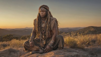 solo,long hair,looking at viewer,black hair,1boy,jewelry,sitting,closed mouth,full body,male focus,outdoors,sky,pants,artist name,signature,dark skin,necklace,bracelet,headband,facial hair,animal,dark-skinned male,grass,scenery,beard,sunset,mountain,realistic,indian style,brown pants,mountainous horizon,desert,braid,barefoot,on ground,twilight