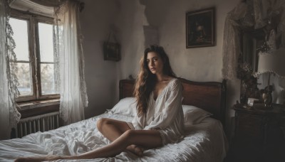 1girl,solo,long hair,brown hair,shirt,black hair,long sleeves,brown eyes,sitting,white shirt,barefoot,indoors,dark skin,dark-skinned female,cup,lips,pillow,window,bed,bed sheet,on bed,sunlight,curtains,realistic,nose,lamp,photo (object),bedroom,picture frame,painting (object),feet