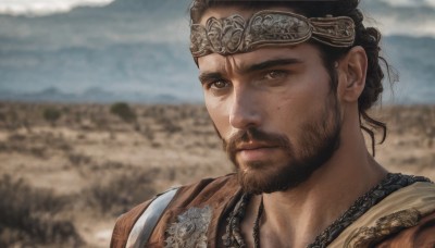 solo,looking at viewer,brown hair,black hair,1boy,brown eyes,jewelry,closed mouth,upper body,male focus,outdoors,day,necklace,blurry,blurry background,headband,facial hair,portrait,beard,mountain,realistic,mustache,manly,sky,cloud,backpack,circlet