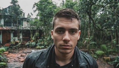 solo,looking at viewer,short hair,brown hair,shirt,black hair,1boy,brown eyes,closed mouth,jacket,upper body,male focus,outdoors,day,blurry,black eyes,tree,black jacket,black shirt,facial hair,denim,building,portrait,realistic,stubble,photo background,denim jacket,collared shirt,blurry background,thick eyebrows,blue jacket,beard,leather,undercut,house,leather jacket