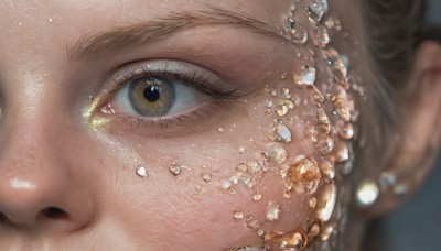 1girl,solo,looking at viewer,blonde hair,brown eyes,hair bun,blurry,lips,eyelashes,depth of field,blurry background,gem,portrait,light particles,close-up,freckles,reflection,crystal,realistic,eye focus,yellow eyes,shiny,water,water drop