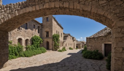 outdoors,sky,day,cloud,tree,blue sky,no humans,window,shadow,grass,plant,building,scenery,door,road,bush,wall,house,path,arch,ruins,pillar,column,stone wall