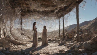 long hair,short hair,multiple girls,brown hair,black hair,dress,2girls,standing,outdoors,sky,day,white dress,looking at another,tree,scenery,rock,ruins,wide shot,skirt,ponytail,mountain,sepia,brown theme,desert