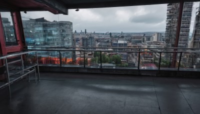 outdoors,sky,day,cloud,tree,no humans,window,cloudy sky,building,scenery,city,railing,road,cityscape,bridge,lamppost,street,skyscraper,grey sky,real world location,rain,fence