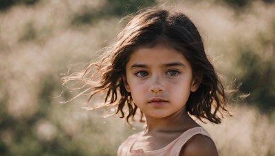 1girl,solo,looking at viewer,short hair,brown hair,black hair,brown eyes,closed mouth,collarbone,upper body,parted lips,sleeveless,signature,dark skin,medium hair,blurry,black eyes,dark-skinned female,lips,grey eyes,floating hair,depth of field,blurry background,expressionless,wind,messy hair,child,portrait,realistic,nose,female child,sunlight,tank top